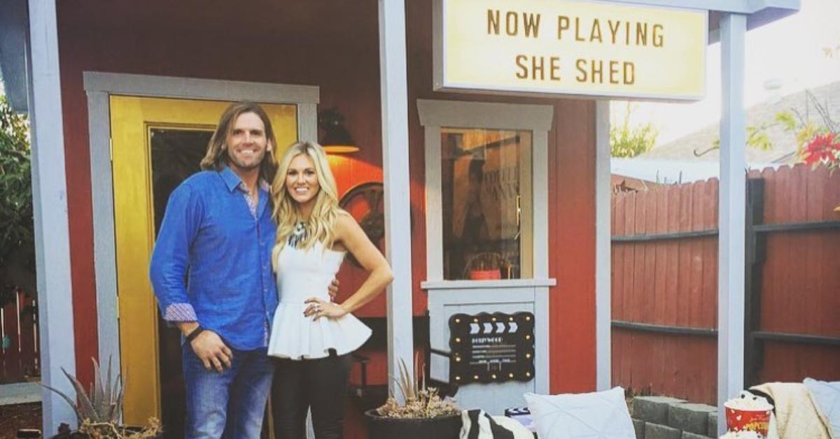 Ty Ferrell and his ex-wife in front of her she shed