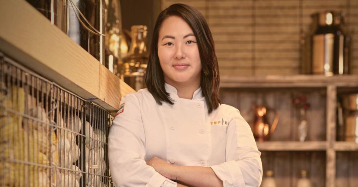 Kaleena Bliss wears a white chef's jacket for her official 'Top Chef: Wisconsin' portrait.