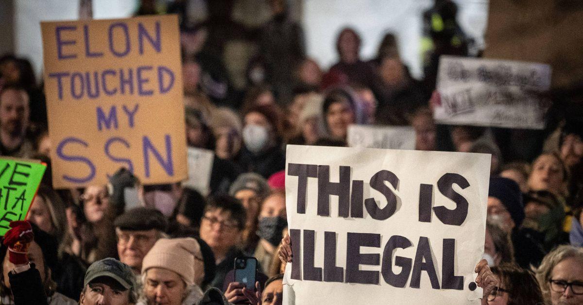 Protesters in New York City protesting Elon Musk's role in the federal government. 