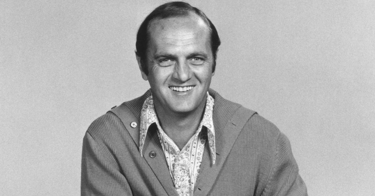 Bob Newhart smiles in a black and white photo