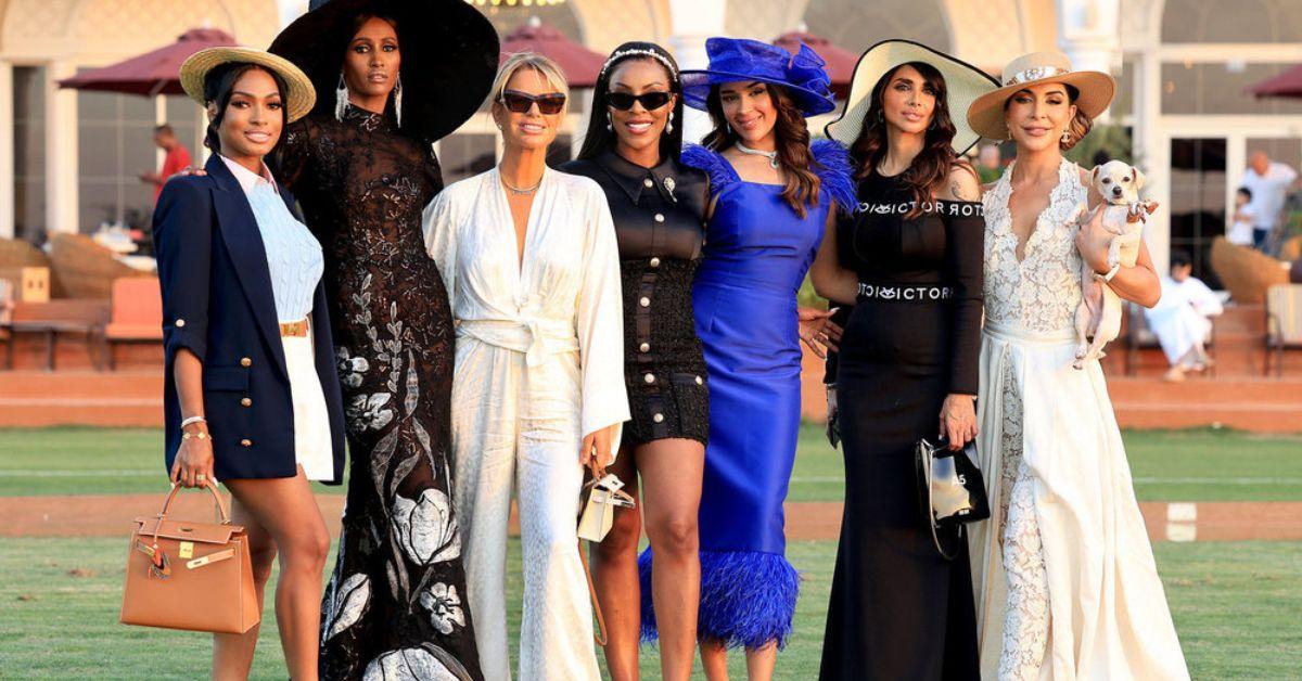 Lesa Milan, Chanel Ayan, Caroline Stanbury, Caroline Brooks, Saba Youssef, Sara Al Madani, and Taleen Marie pose for a photo at the Polo match on 'RHODubai'