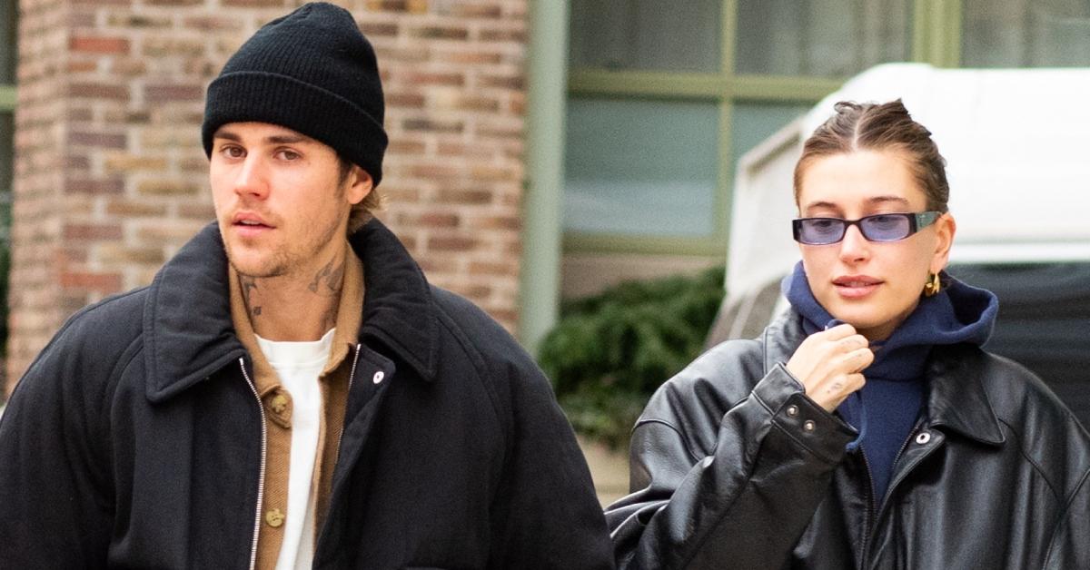 Justin Bieber walking around with his wife, Hailey Bieber.