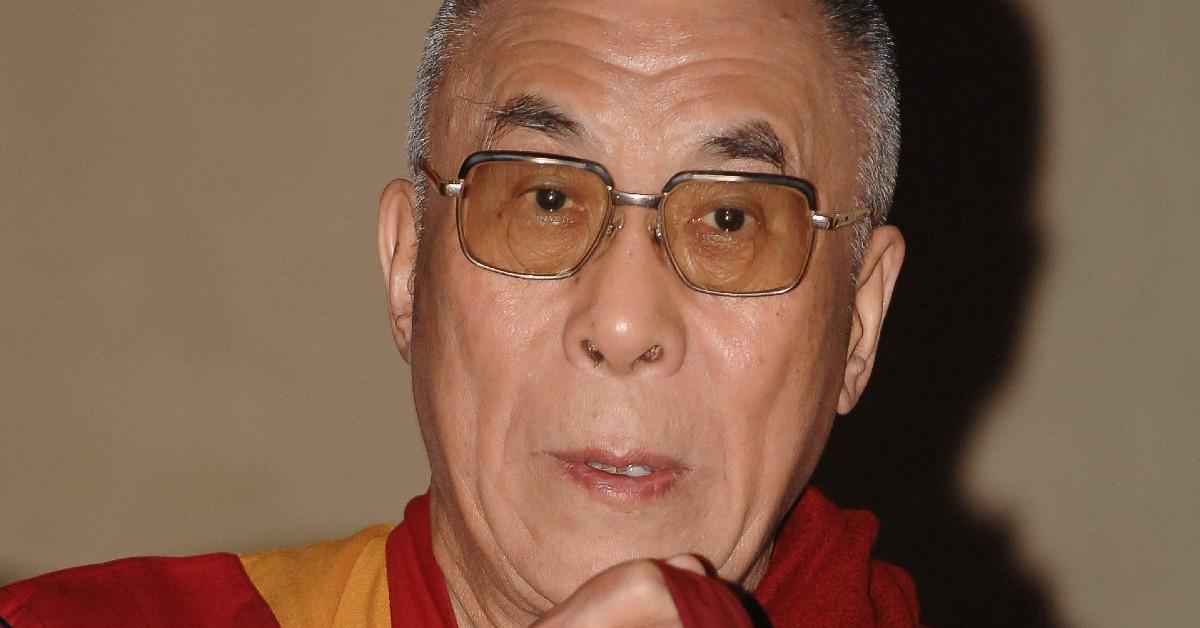 Dalai Lama looking a little surprised for a photo