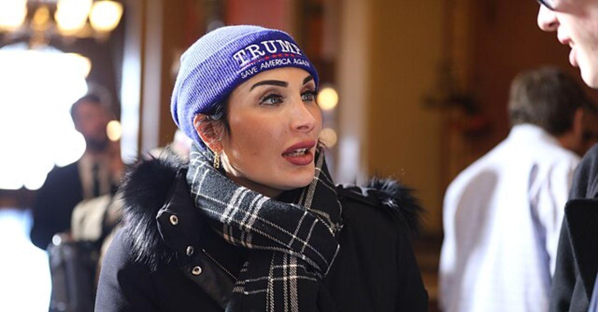 Laura Loomer in a Trump beanie. 