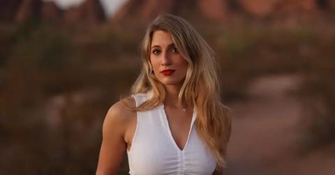 Olivia Plath in a white shirt