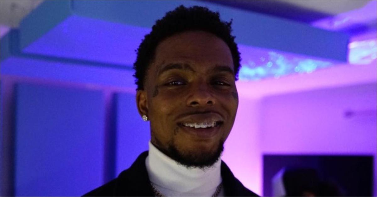 Recording artist GoGetta.Kb smiles for Instagram. 