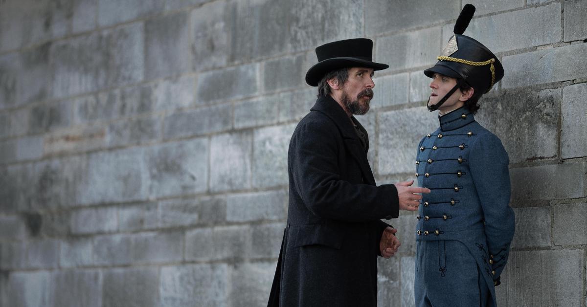 Christian Bale as Det. Augustus Landor and Harry Melling as Edgar Allan Poe in 'The Pale Blue Eye'