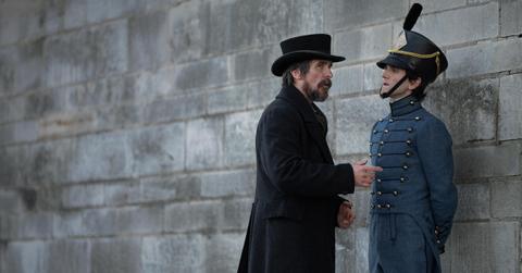 Christian Bale as Det. Augustus Landor and Harry Melling as Edgar Allan Poe in 'The Pale Blue Eye'