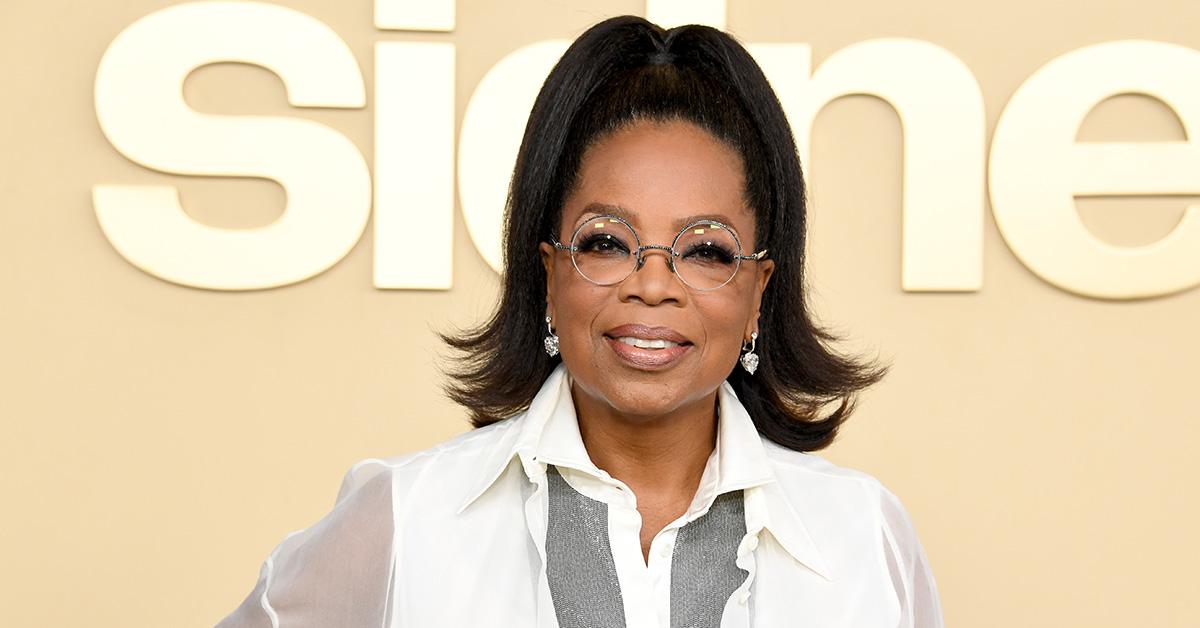 Oprah Winfrey on the red carpet in white. 