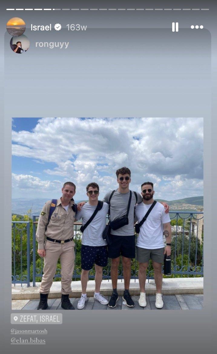 Elan Bibas pictured with an IDF non-combat solider.