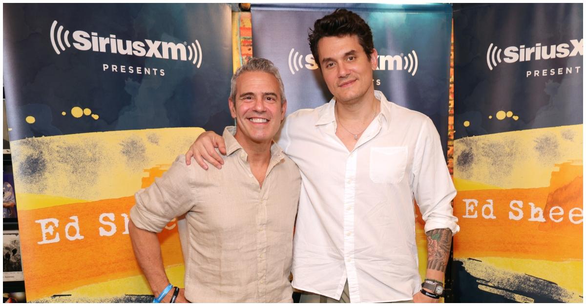 (l-r): Andy Cohen and John Mayer embracing at a Sirius XM event