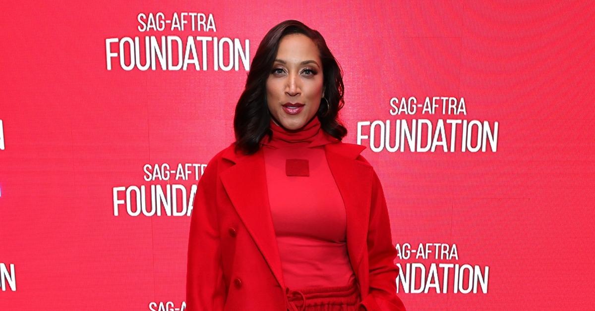 Robin Thede poses in front of a red background SAG-AFTRA Foundation Conversations "A Black Lady Sketch Show" Screening And Q&A in New York.
