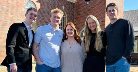 Ree Drummond and four of her kids standing outside of a church.