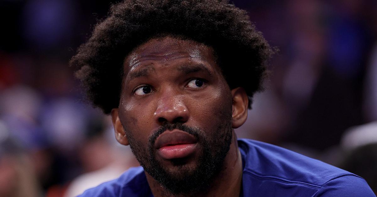 Joel Embiid sitting on the bench during game 1 of 76ers vs. Knicks. 