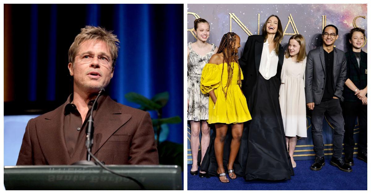 Brad Pitt and Angelina Jolie and her children at a red carpet. 