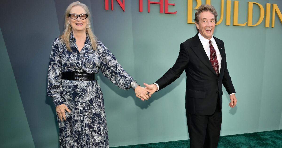 Martin Short and Meryl Streep holding hands at the 'OMITB' Season 4 premiere.