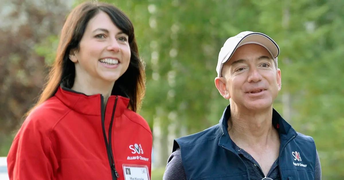 MacKenzie Scott in a red jacket and Jeff Bezos in a blue vest.