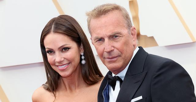 Kevin Costner and Christine Baumgartner at the 94th Academy Awards.