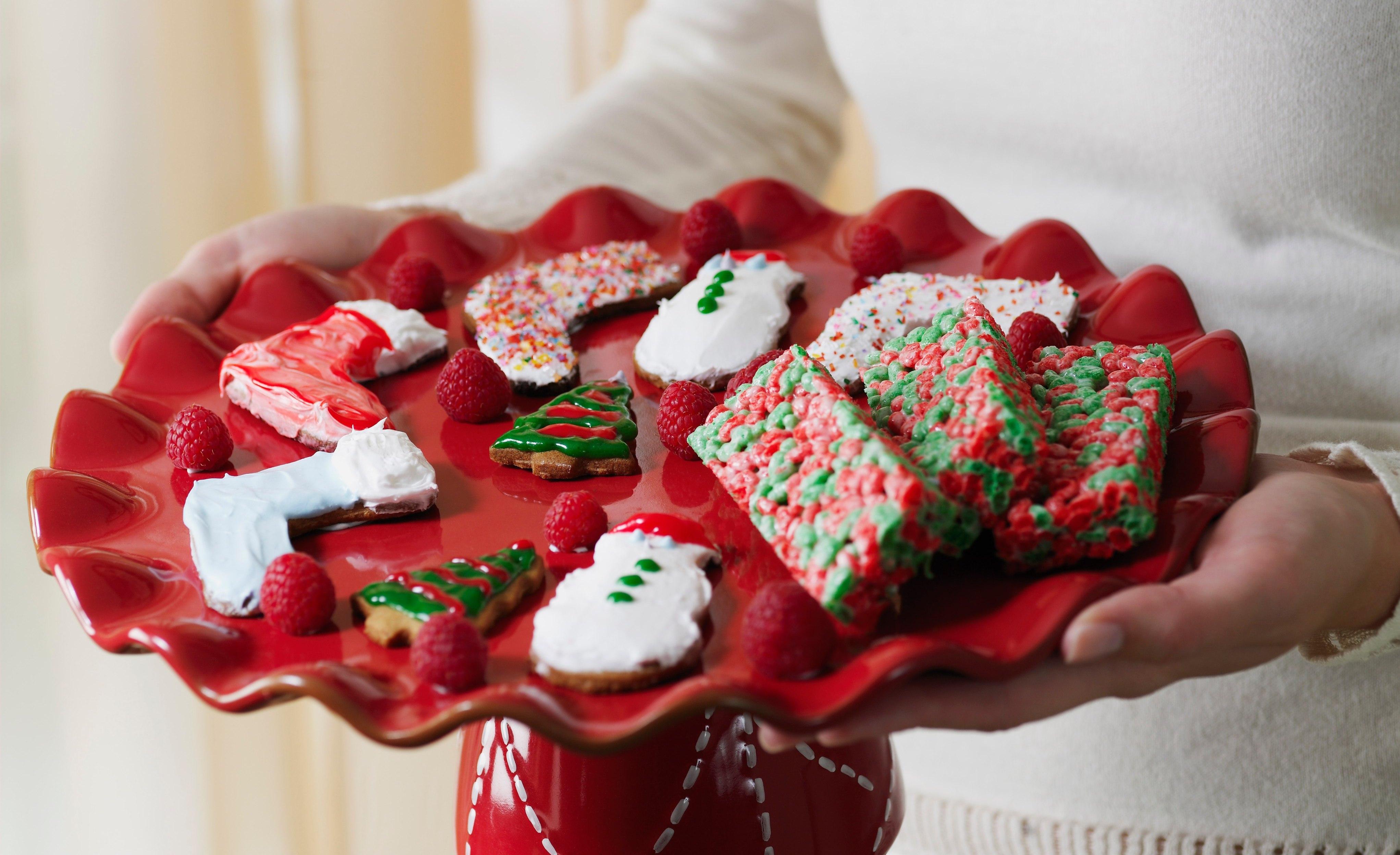 A plate full of Christmas cookies.