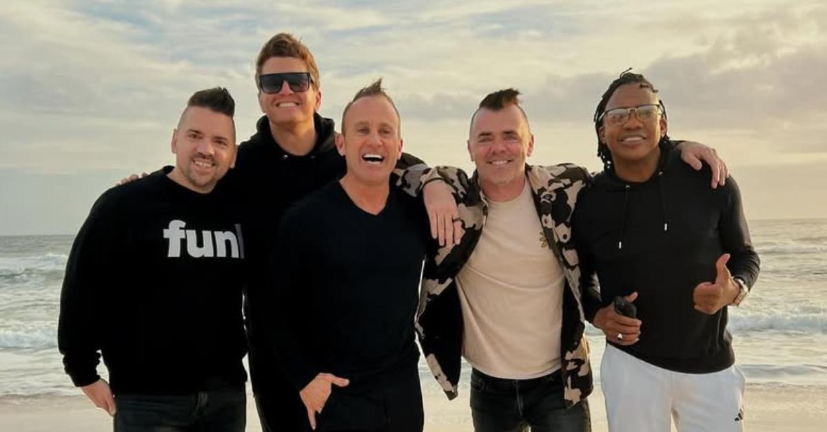 Michael Tait and Newsboys posing together in May 2024.