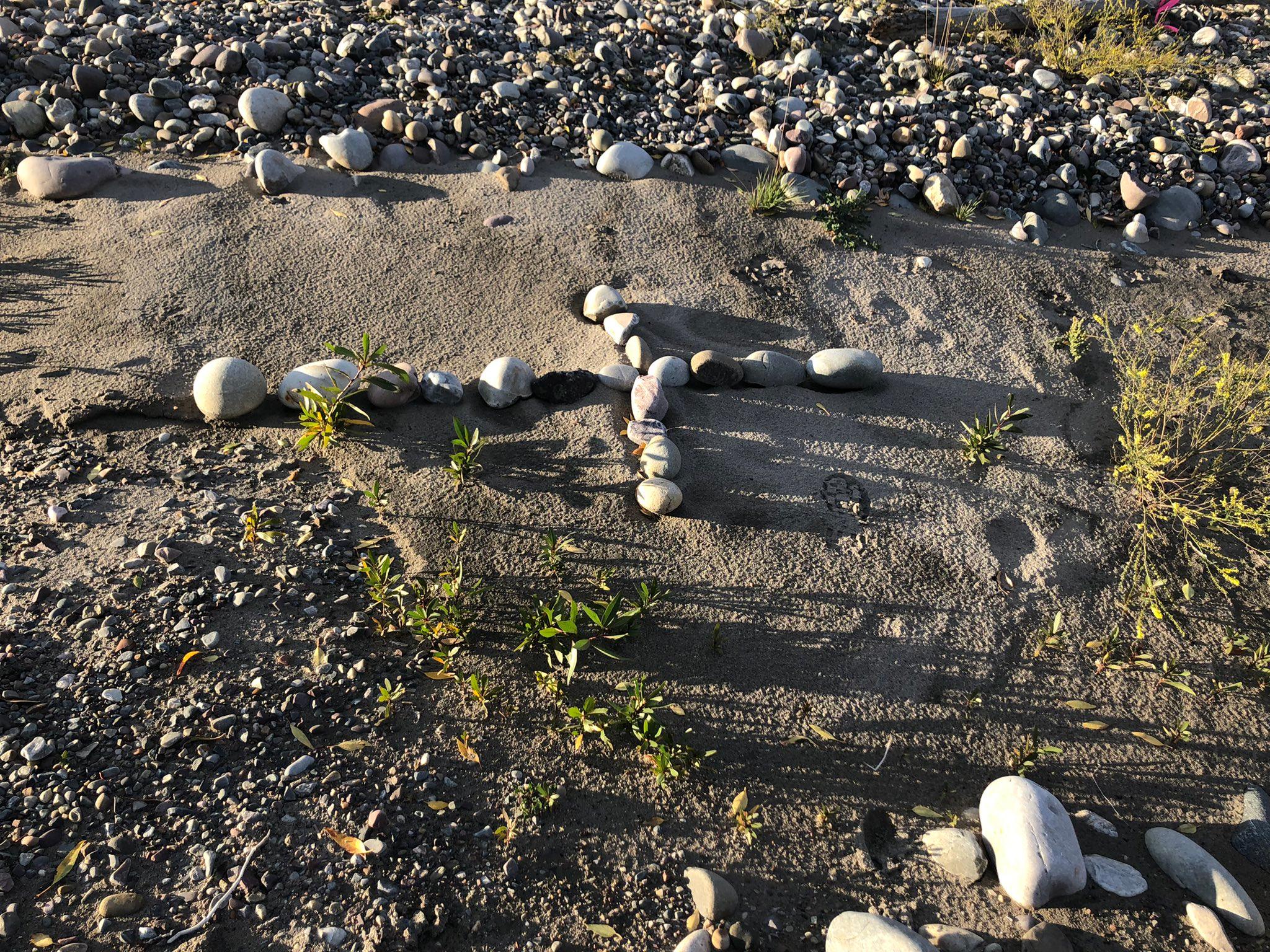 A stone cross memorial where Gabby Petito's remains were found