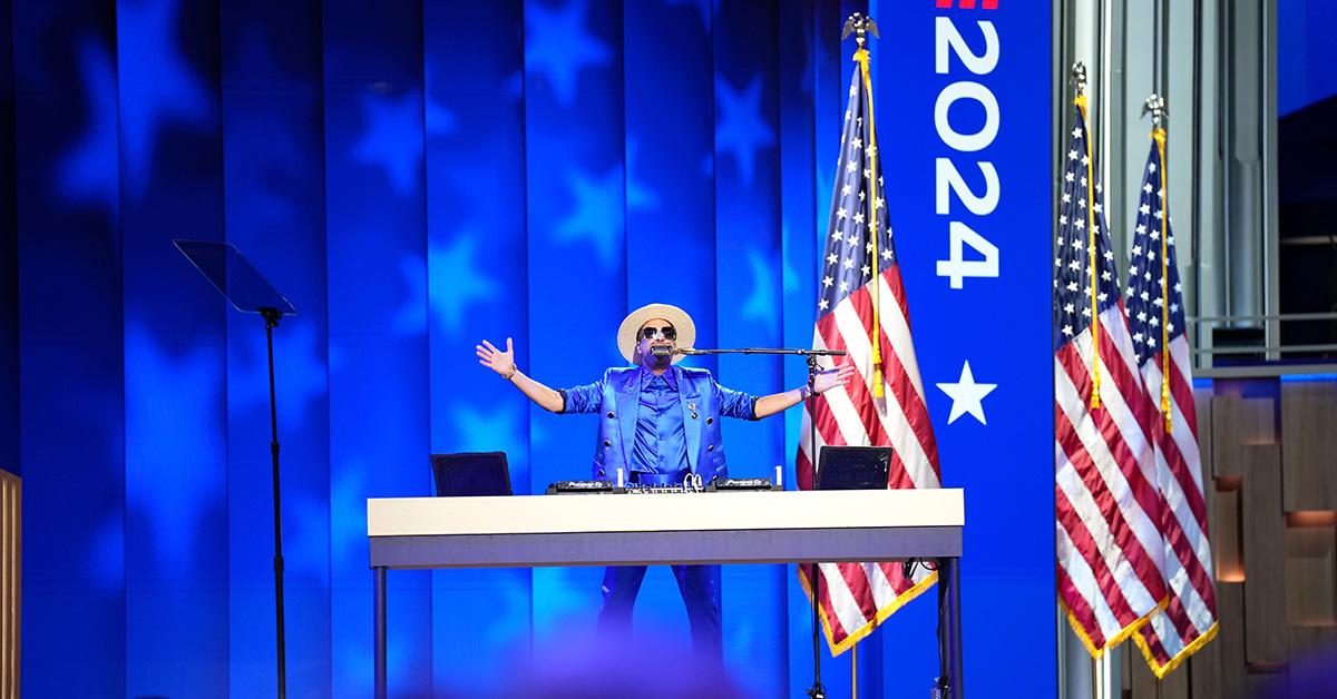 DJ Cassidy raising his hands at the 2024 DNC. 