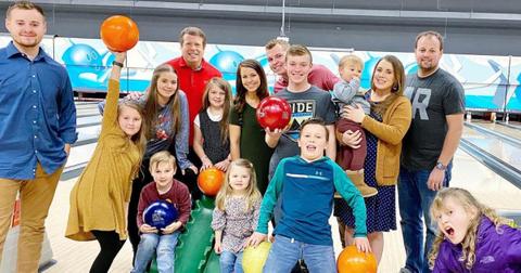 Josh Duggar at a bowling alley with his wife and kids and family