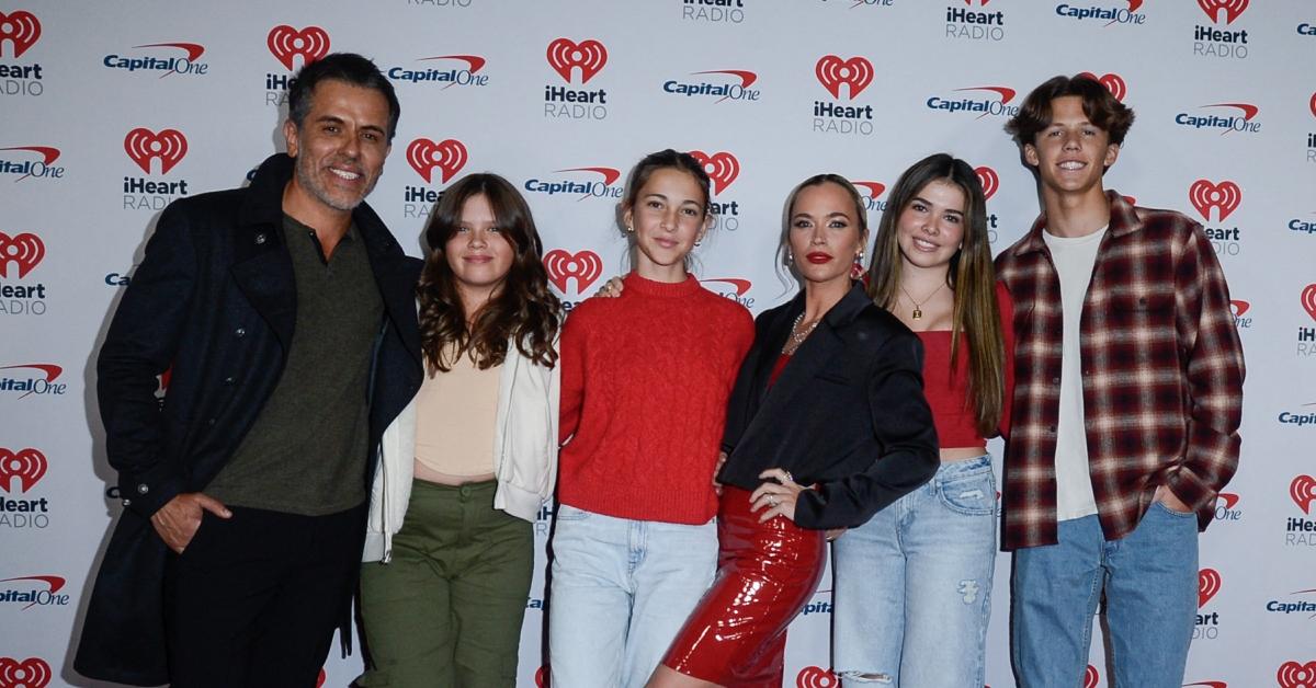 (l-r): Edwin Arroyave, Teddi Mellencamp, and their children at an iHeartRadio event.