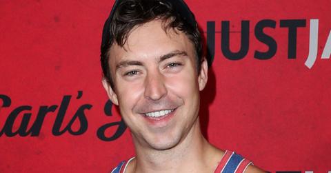 Brian Jordan Alvarez attending a screening, posing for a photo