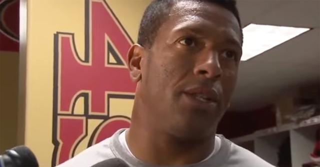 Clark Haggans talking to press following a 49ers game.