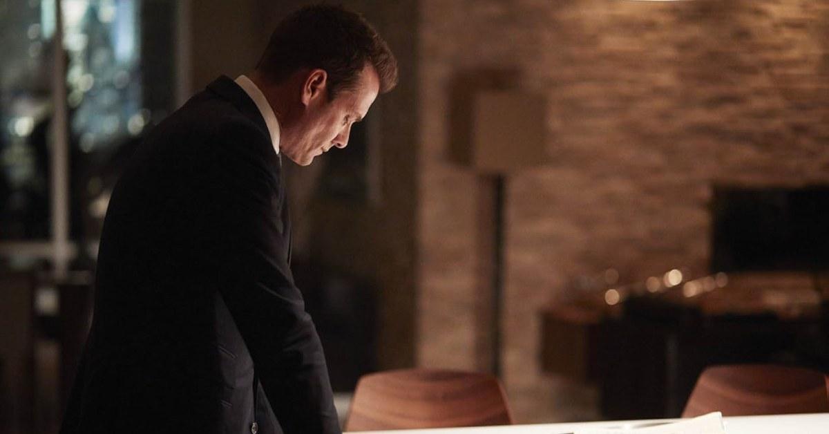 Harvey Specter (Gabriel Macht) looking at the table in 'Suits'.