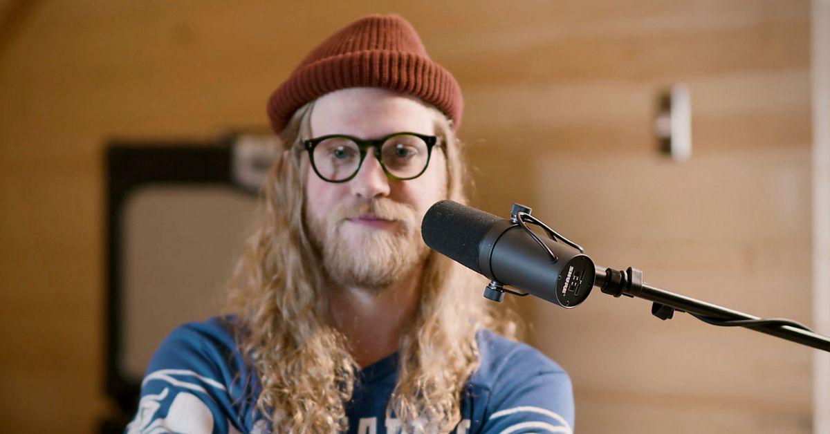 Allen Stone performing with a mic and keyboard 2020