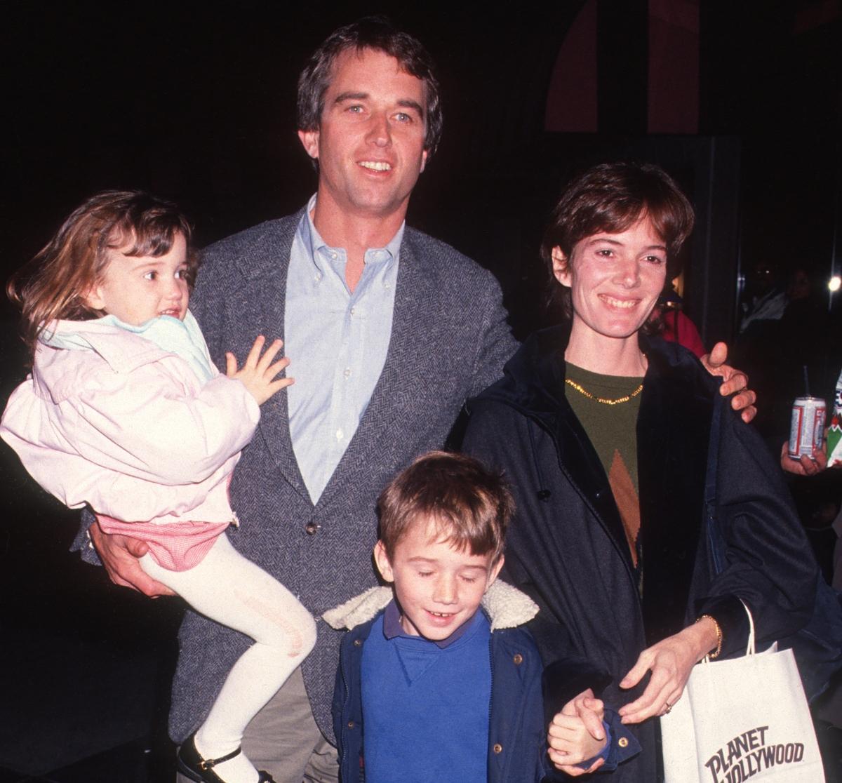 Married couple American lawyer Robert F Kennedy Jr and Emily Ruth Black, and their children, Kathleen Alexandra Kennedy & Robert Francis Kennedy III, attend a premiere party for 'Addams Family' at Planet Hollywood, New York, New York, November 17, 1991. (Photo by Ron Galella, Ltd./Ron Galella Collection via Getty Images)