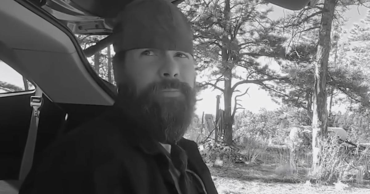 Lyndon McLeod in a black and white still from a video