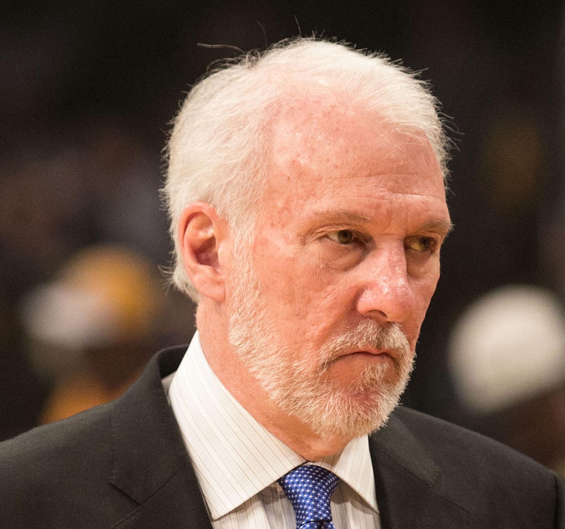 Gregg popovich in a suit