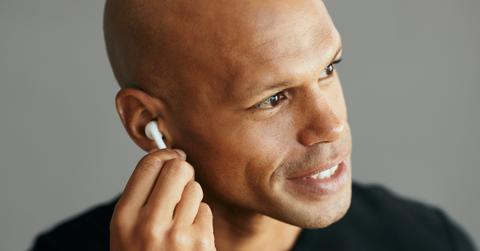 man with one AirPod in