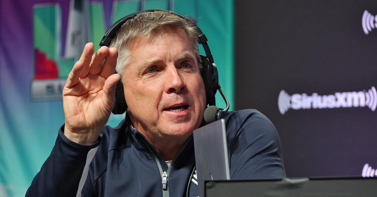 Sean Payton providing commentary about Super Bowl LVII wearing a headset. 