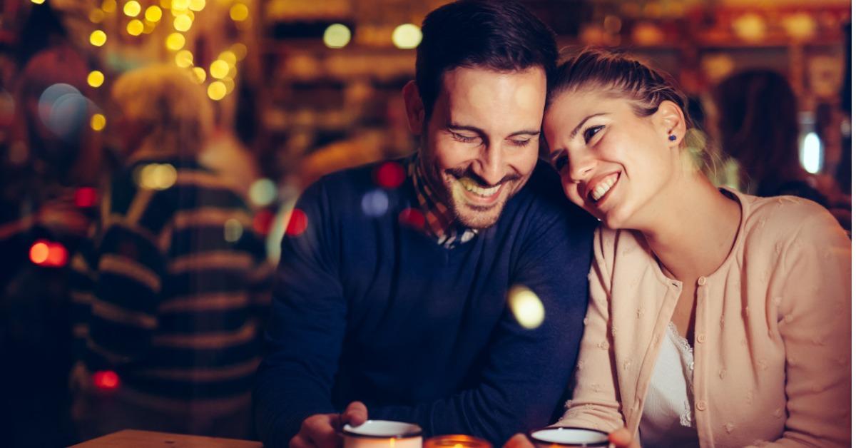 romantic couple dating in pub at night picture id