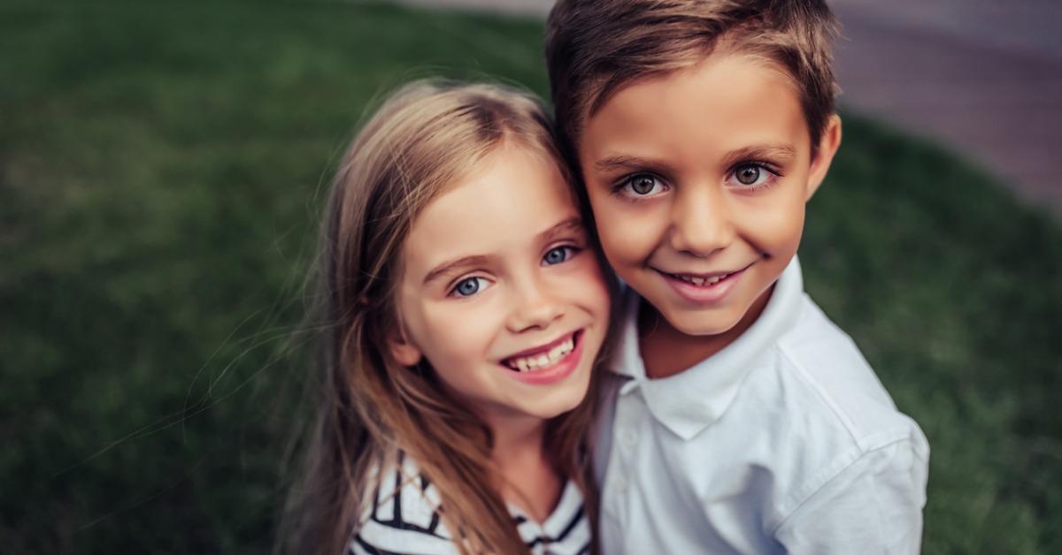 children on green grass picture id