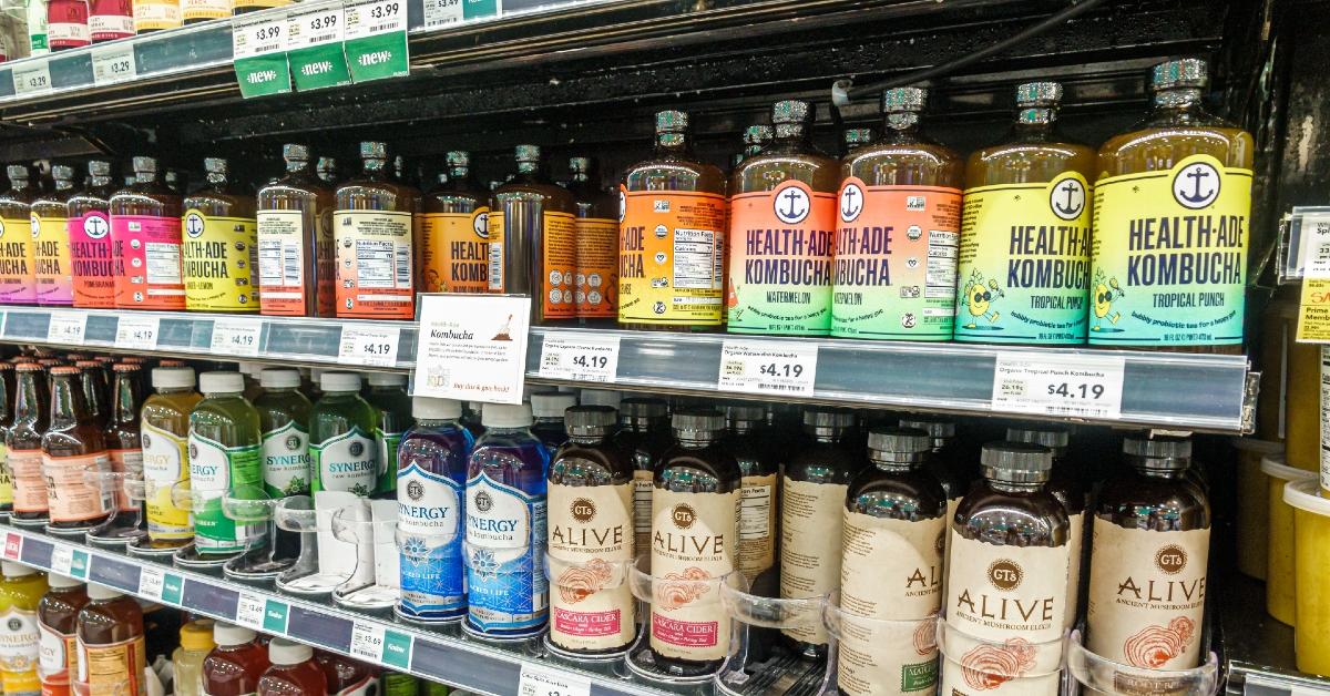 kombucha bottles on grocery store shelves