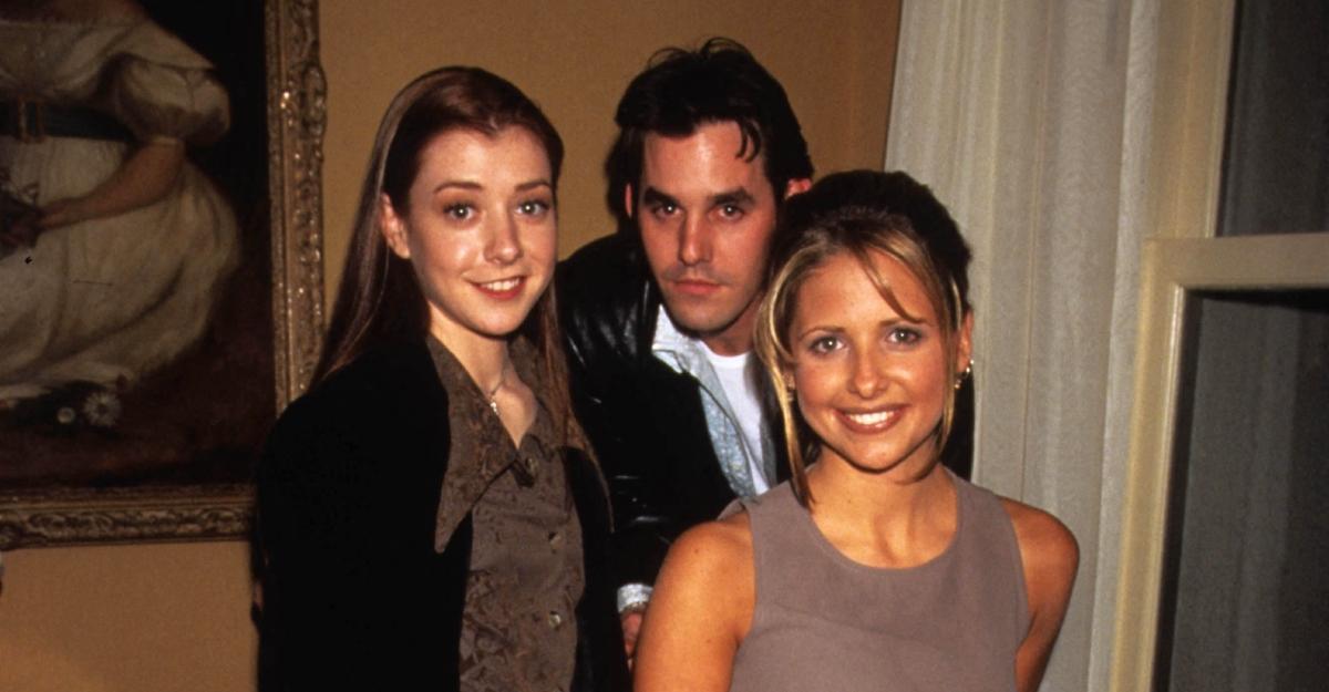 Alyson Hannigan, Nicholas Brendon, and Sarah Michelle Gellar at a party in 2002