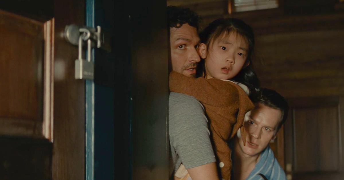 (L-R) Ben Aldridge as Andrew, Kristen Cui as Wen, and Jonathan Groff as Eric in 'Knock at the Cabin'