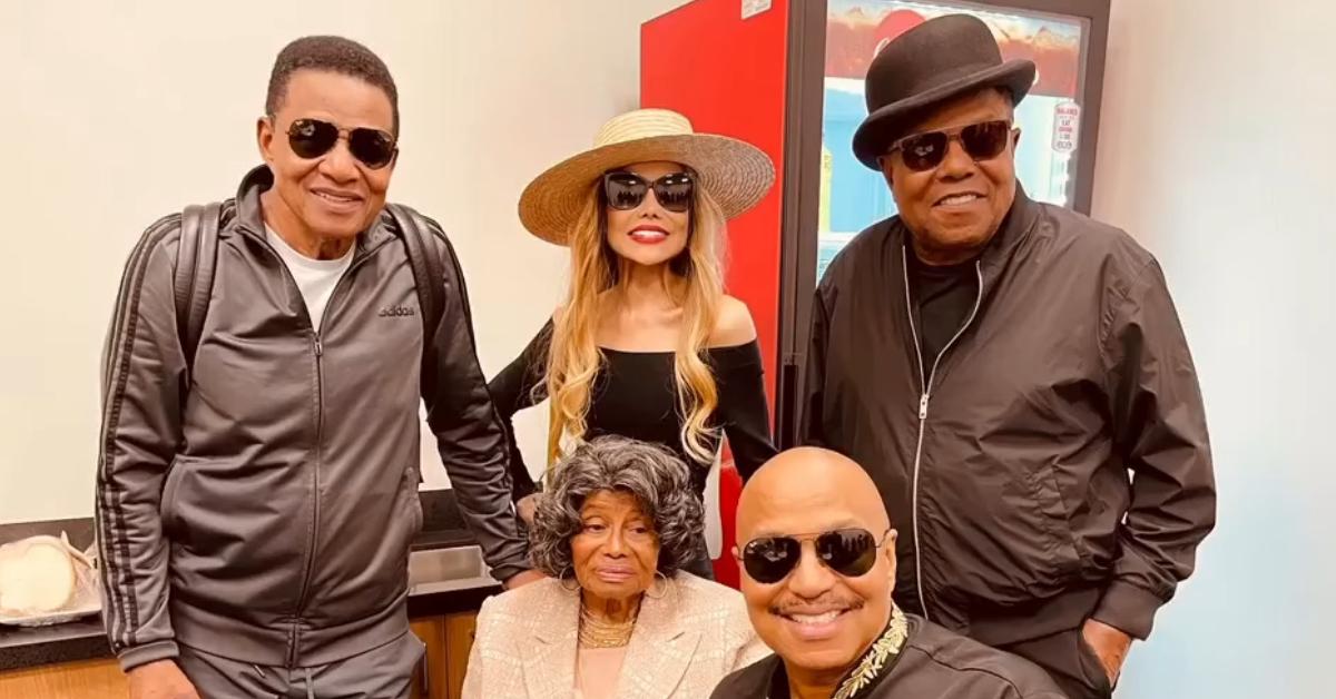 La Toya and Tito Jackson pose for a photo with their family just weeks before Tito's death.