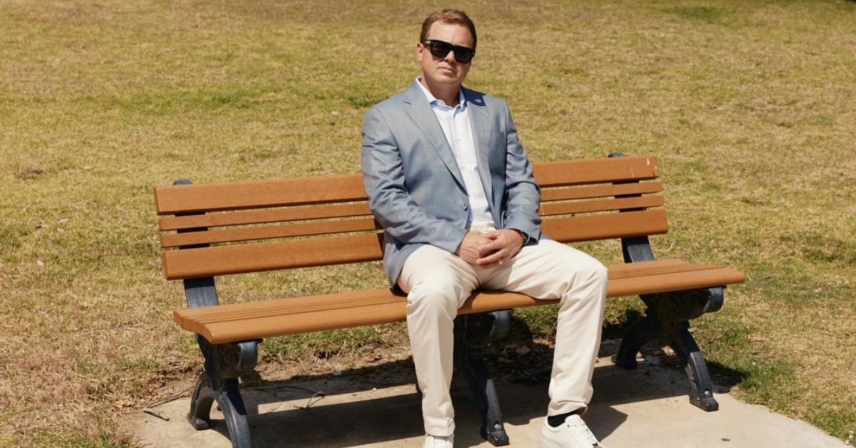 Spencer Pratt on a park bench during a campaign video.