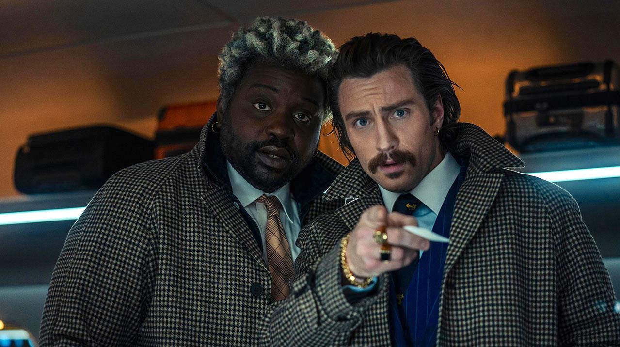 Aaron Taylor-Johnson as "Tangerine" and Brian Tyree Henry as "Lemon" in 'Bullet Train.'