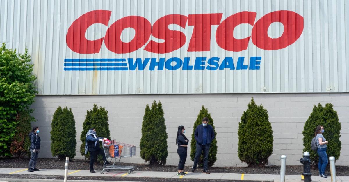 People wait in line at a Costco during the COVID-19 pandemic. 