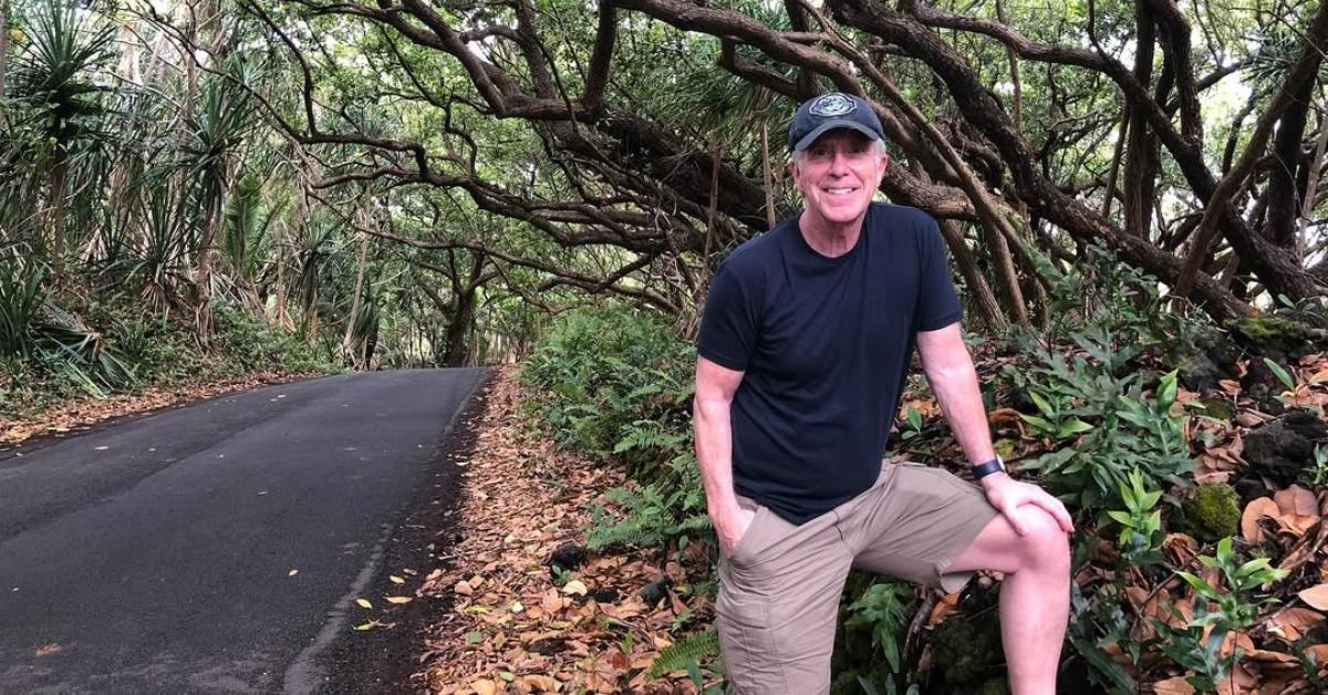 Tom Bergeron by a road in Hawaii.