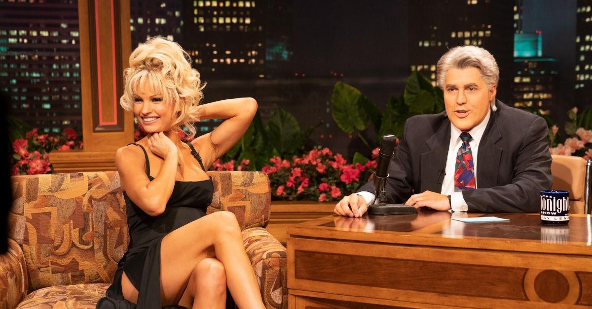 (l-r): Lily James and Adam Ray as Pamela Anderson and Jay Leno on 'Pam & Tommy.'