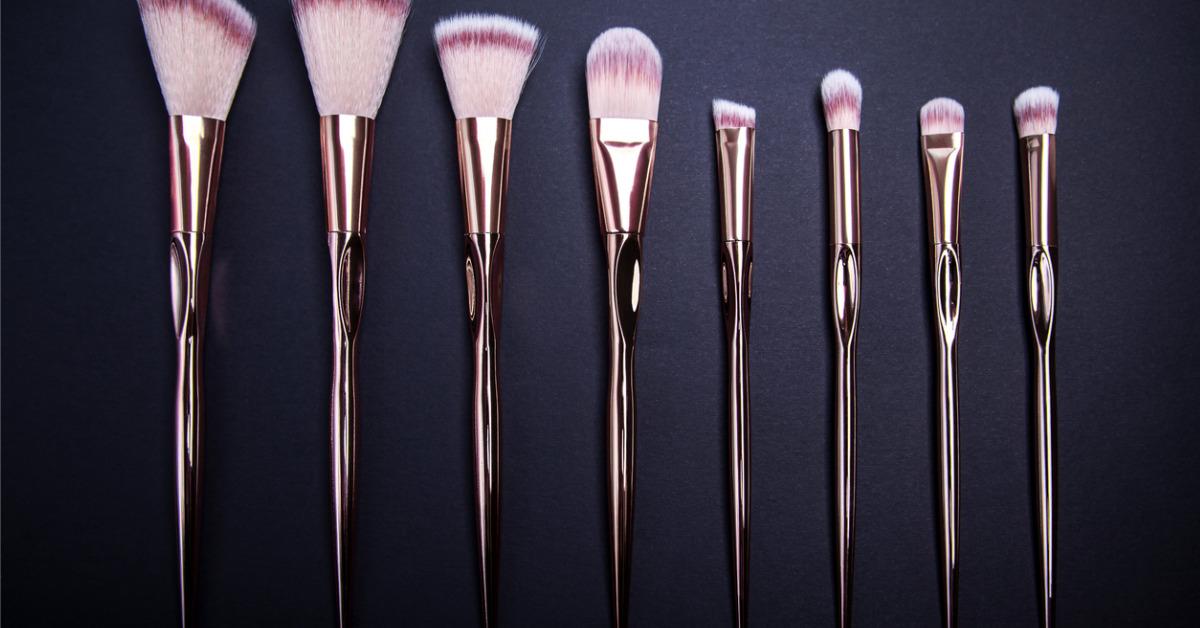 set of makeup brushes for beautiful makeup looks on black background picture id