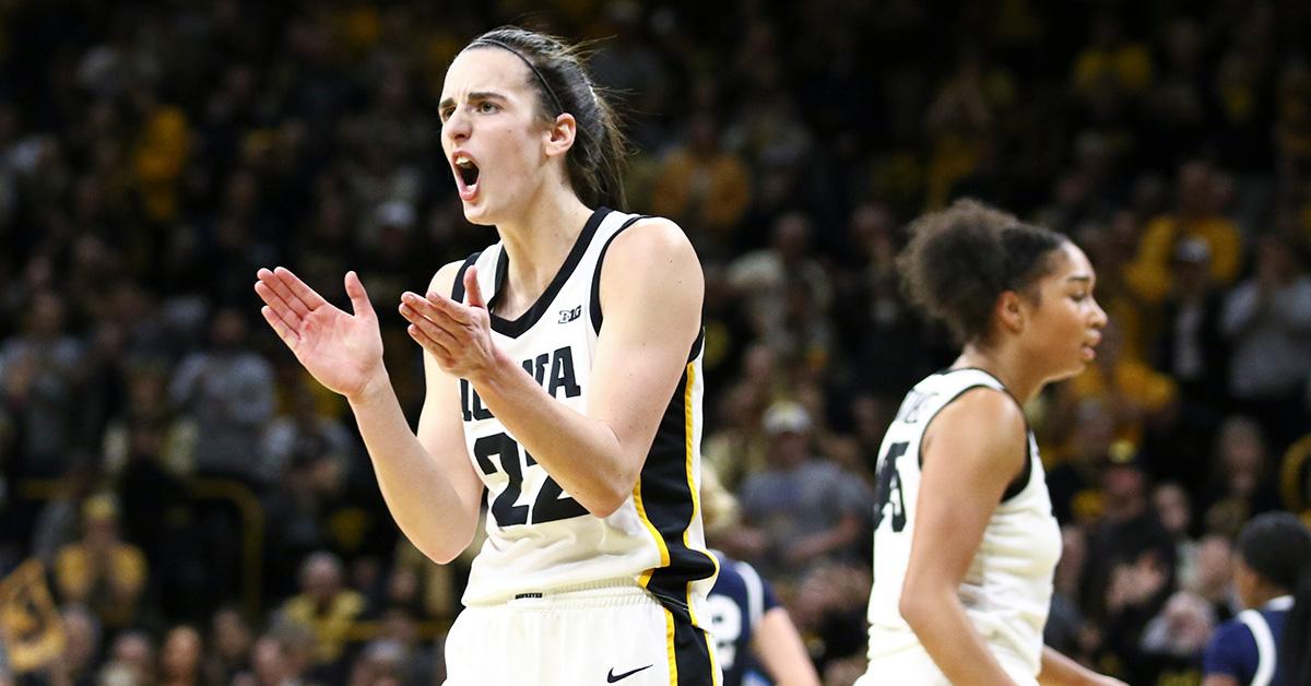 Caitlin Clark clapping during a University of Iowa game. 